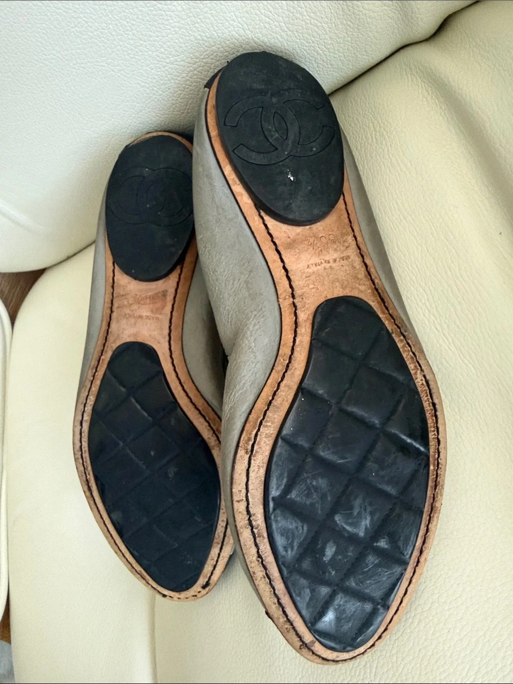 CHANEL Leather Gary and Black Cap-Toe Ballet FlatsToe Ballet Flats